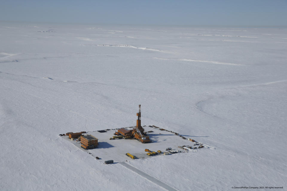 This 2019 aerial photo provided by ConocoPhillips shows an exploratory drilling camp at the proposed site of the Willow oil project on Alaska's North Slope. The Biden administration's approval of the massive oil development in northern Alaska on Monday, March 13, 2023, commits the U.S. to yet another decades-long crude project even as scientists urgently warn that only a halt to more fossil fuel emissions can stem climate change. ConocoPhillips' Willow project was approved Monday and would result in at least 263 million tons of planet-warming gases over 30 years. (ConocoPhillips via AP)