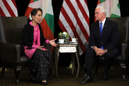 Myanmar's State Counsellor Aung San Suu Kyi and U.S. Vice President Mike Pence hold a bilateral meeting in Singapore, November 14, 2018. REUTERS/Athit Perawongmetha