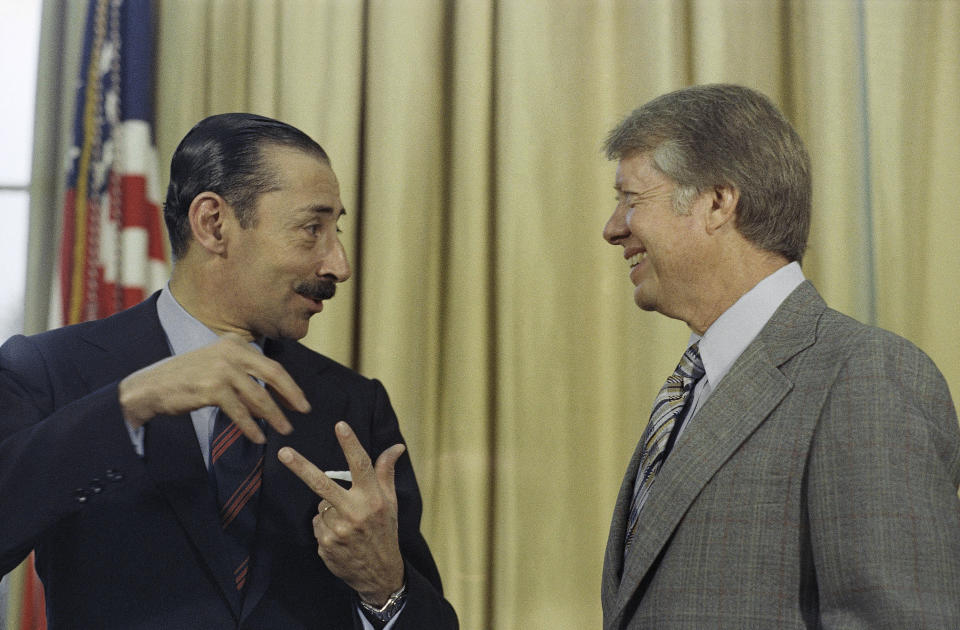 FILE - President Jimmy Carter with Jorge R. Videla, President of Argentina, at a meeting at the White House in Washington on Sept. 9, 1977. (AP Photo/Bob Daugherty, File)