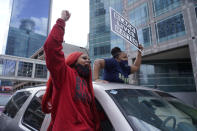 People cheer after a guilty verdict was announced at the trial of former Minneapolis police Officer Derek Chauvin for the 2020 death of George Floyd, Tuesday, April 20, 2021, in Minneapolis, Minn. Former Minneapolis police Officer Derek Chauvin has been convicted of murder and manslaughter in the death of Floyd. (AP Photo/Morry Gash)