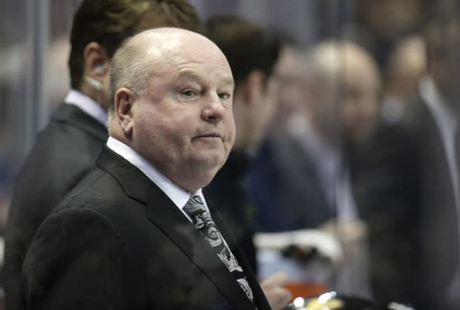 FILE - This Jan. 21, 2014, file photo shows Anaheim Ducks head coach Bruce Boudreau during the first period of an NHL hockey game against the Winnipeg Jets in Anaheim, Calif. Boudreau agreed to a two-year contract extension through the 2016-17 season on Wednesday, Sept. 10, 2014. (AP Photo/Jae C. Hong,File)