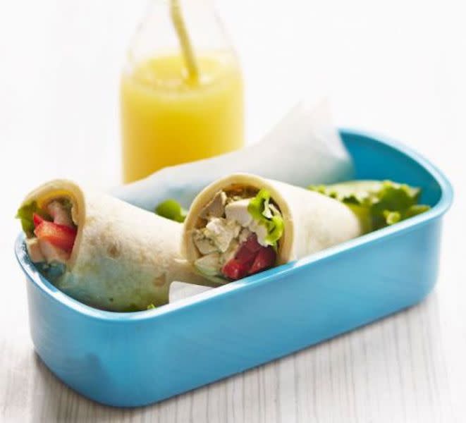 <p>Wave goodbye to soggy sandwiches and prep tortilla wraps for your children’s lunches. No need to fire up the oven, as these chicken and veggie delights will take a maximum of ten minutes to make. Simply mix together shredded chicken, sour cream or yoghurt with pesto. Layer a slice of cheese on each wrap before adding the chicken mixture then finish with red pepper and sweetcorn. Yep, they’re perfect for work too. For the full recipe, visit <a rel="nofollow noopener" href="https://www.bbcgoodfood.com/recipes/chicken-pesto-wrap" target="_blank" data-ylk="slk:BBC Good Food;elm:context_link;itc:0;sec:content-canvas" class="link ">BBC Good Food</a>. </p>