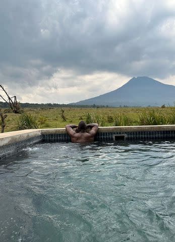 <p>Sabrina Dhowre Elba/Instagram</p> Idris Elba soaks up Rwandan scenery.