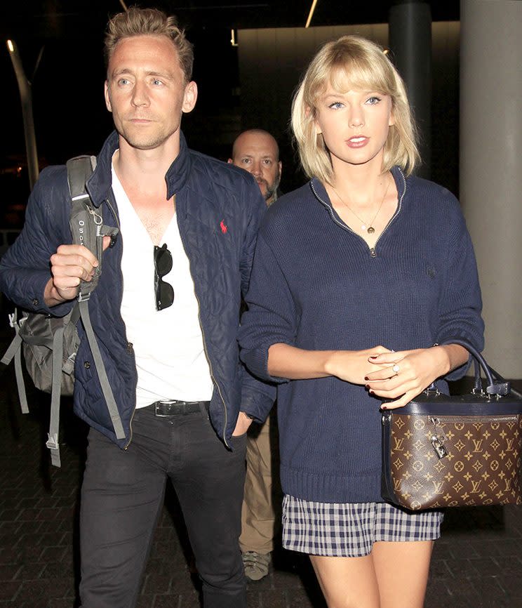 Tom Hiddleston and Taylor Swift at LAX. (Photo: Splash News)