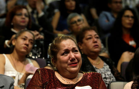 Relative of five youths killed in 2016 after police kidnapped them and then turned them over to members of a drug gang, reacts during a public apology by the Veracruz state government, in Mexico City, Mexico March 4, 2019. REUTERS/Daniel Becerril