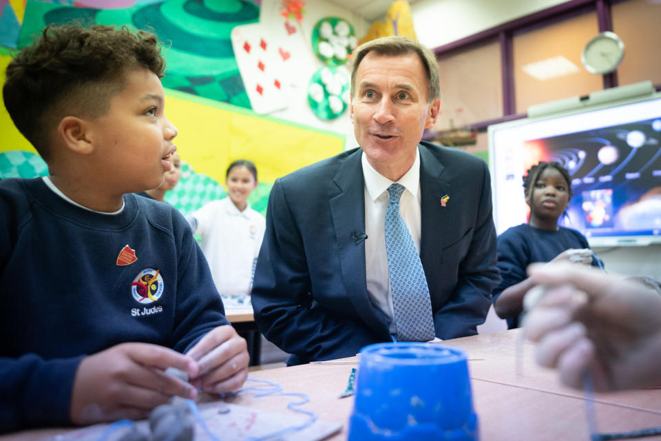 childcare  Chancellor of the Exchequer Jeremy Hunt meets pupils at St Judes Church of England Primary School in south London after delivering his autumn statement to Parliament earlier today. Picture date: Thursday November 17, 2022. (Photo by Stefan Rousseau/PA Images via Getty Images)