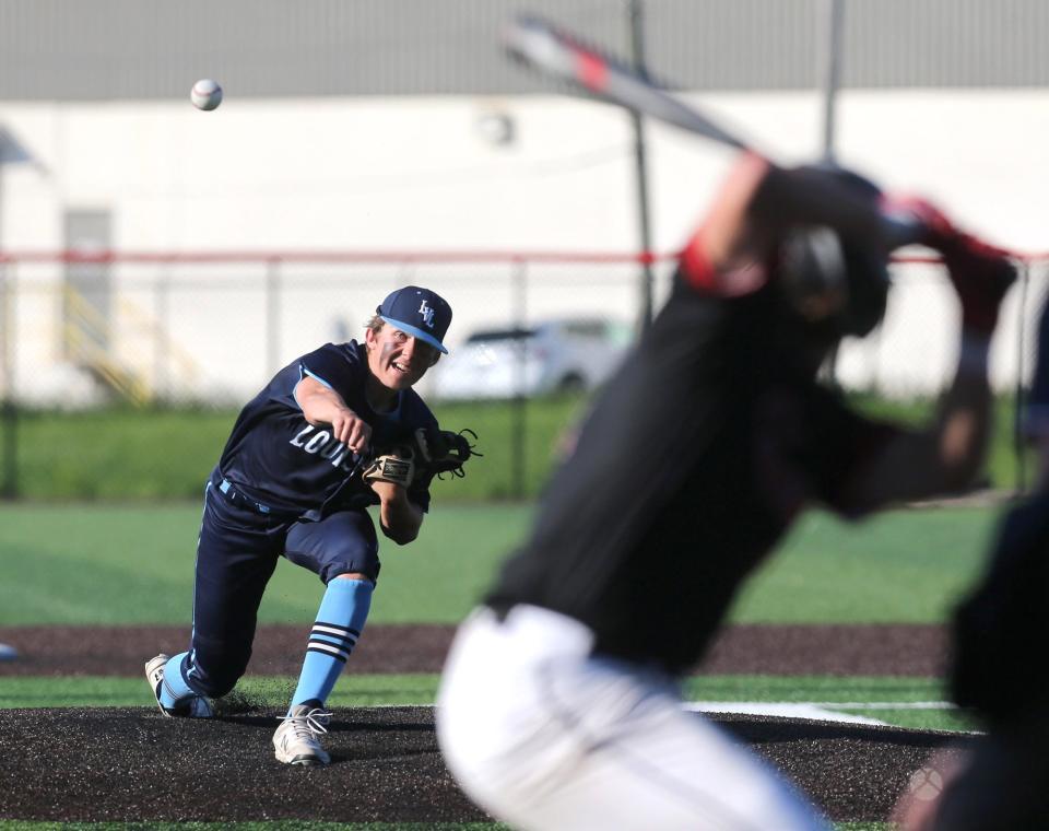 Connor Morley of Louisville delivers a pitch during their DII regional final against Chardon at Thurman Munson Memorial Stadium on Friday, June 3, 2022.