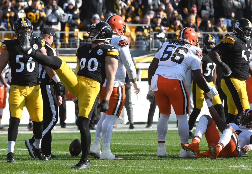 Steelers linebacker T.J. Watt (90) celebrates a sack of Cleveland Browns quarterback Deshaun Watson (4) on Jan. 8 in Pittsburgh.