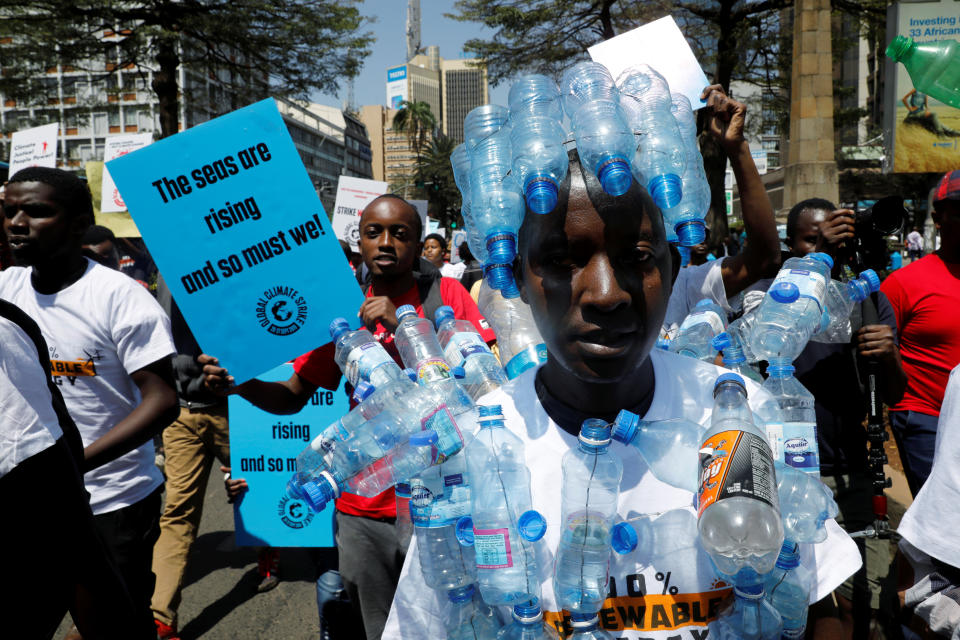 An environmental activist holds a sign as he takes part in the Climate strike protest calling for action on climate change, in Nairobi, Kenya, September 20, 2019. (Photo: Baz Ratner/Reuters)