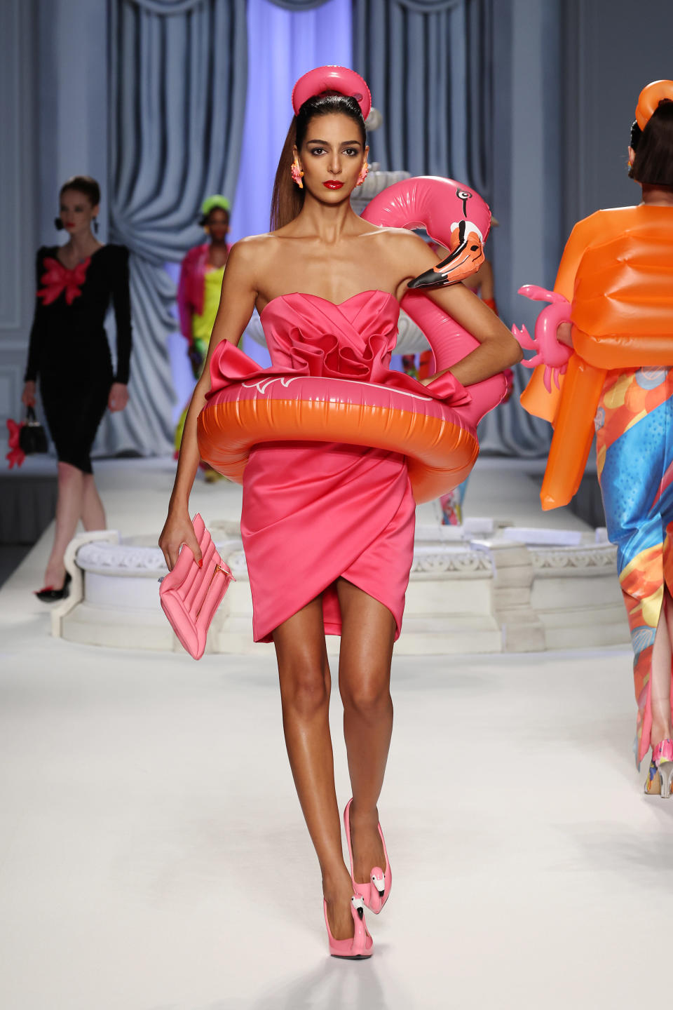 A pool float look from Moschino spring summer ’23. - Credit: Getty Images