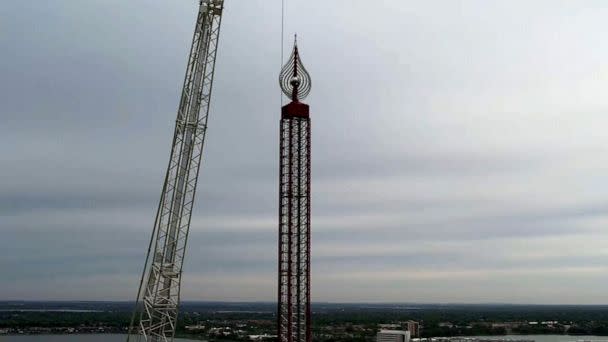 PHOTO: Crews work to dismantle the Orlando FreeFall ride at ICON Park, March 15, 2023. (WFTV)