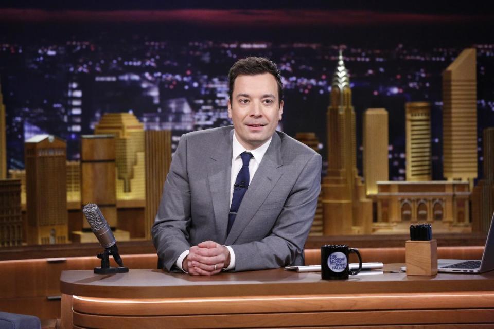 In this photo provided by NBC, Jimmy Fallon appears during his "The Tonight Show" debut on Monday, Feb. 17, 2014, in New York. Fallon departed from the network's “Late Night” on Feb. 7, 2014, after five years as host, and is now the host of “The Tonight Show,” replacing Jay Leno after 22 years. (AP Photo/NBC, Lloyd Bishop)