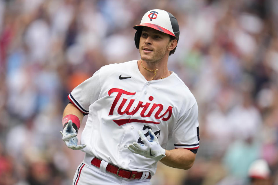 Minnesota Twins' Max Kepler celebrates after hitting a three-run triple during the seventh inning of a baseball game against the New York Mets, Saturday, Sept. 9, 2023, in Minneapolis. (AP Photo/Abbie Parr)