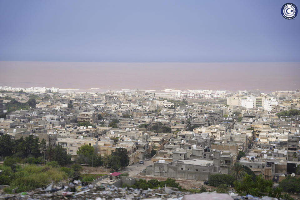 In this photo provided by the Libyan government, muddied seawaters caused by heavy flooding are visible off the coast of the city of Derna, Libya, on Monday, Sept. 11, 2023. Mediterranean storm Daniel caused devastating floods in Libya that broke dams and swept away entire neighborhoods and wrecked homes in multiple coastal towns in the east of the North African nation. (Libyan government via AP)