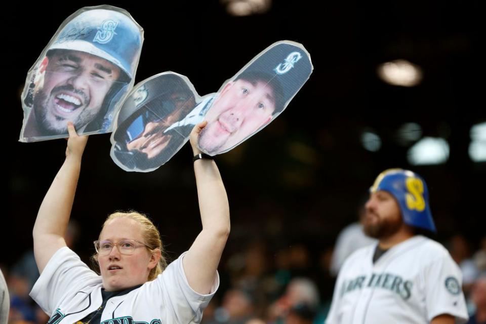 SEATTLE, WASHINGTON - SEPTEMBER 30: Fans cheer before the game between the Seattle Mariners and the Texas Rangers at T-Mobile Park on September 30, 2022 in Seattle, Washington. (Photo by Steph Chambers/Getty Images)