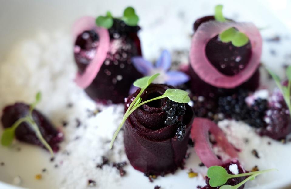 Beet Roses, feta, pickled red onion, Beet-Pistachio Crumble, Beet Emulsion from Foglia, a new plant based restaurant in Bristol.