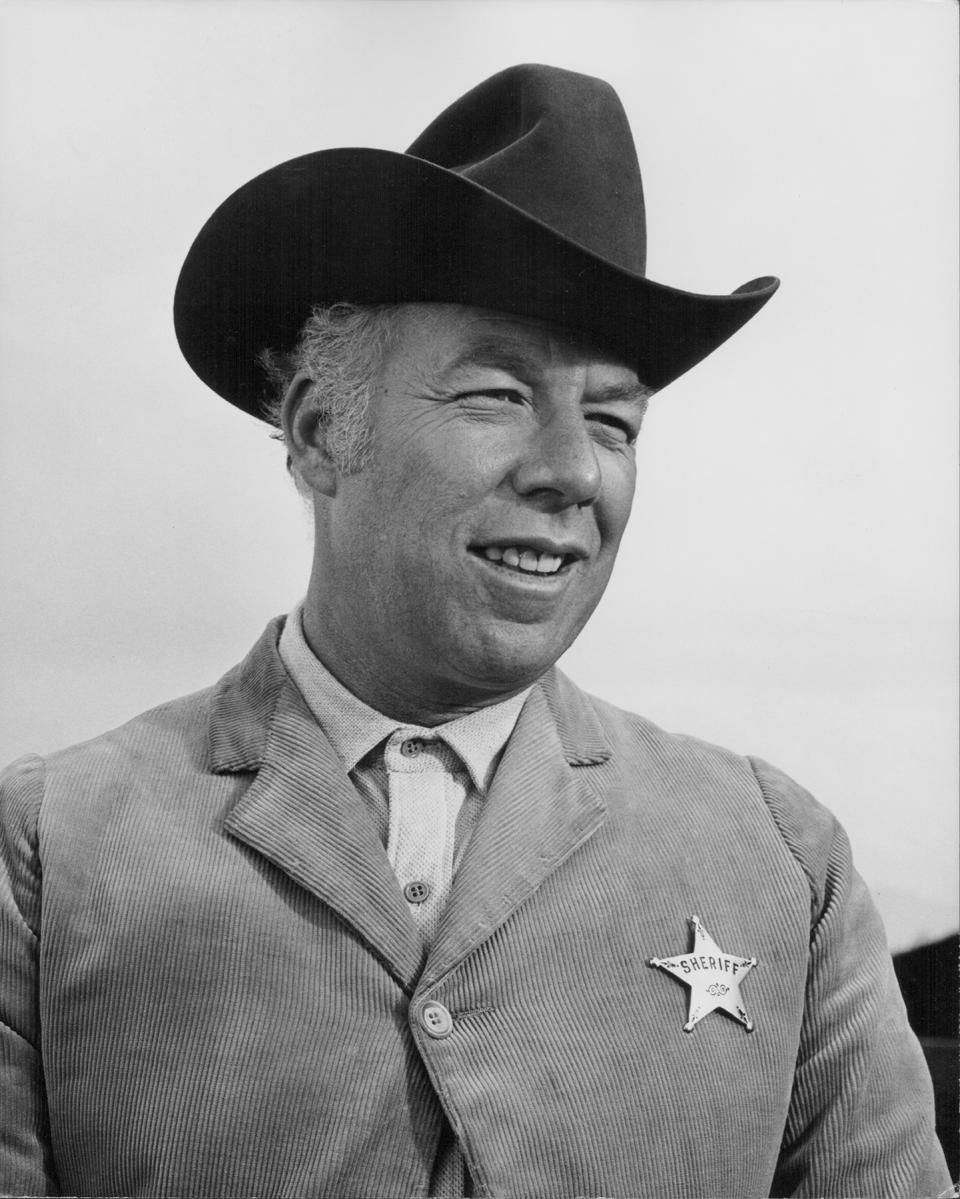 <p>George Kennedy, an actor who won the best supporting actor Academy Award for his role in Cool Hand Luke, died at age 91 on February 28. — (Pictured) Actor George Kennedy in a scene from the movie ‘Dirty Dingus Magee’, 1970. ( Stanley Bielecki Movie Collection/Getty Images) </p>
