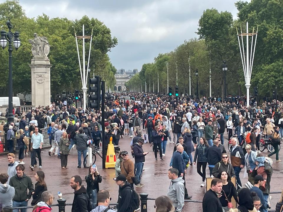 People gather on The Mall, outside Buckingham Palace (Jonathan Kanengoni)