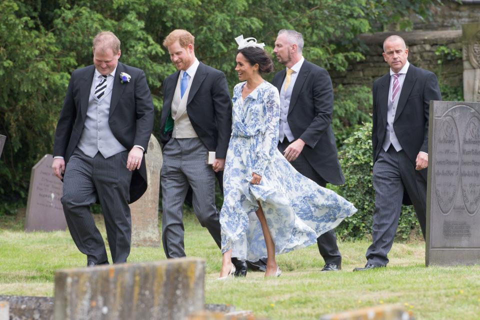 <p>Meghan Markle and Prince Harry attend cousin Celia McCorquodale’s wedding to George Woodhouse in Lincolnshire. (Photo: Geoff Robinson Photography/REX/Shutterstock) </p>