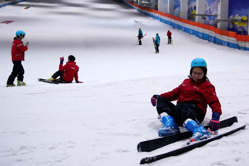 People attend indoor ski park at Qiaobo Ice and Snow World in Shaoxing