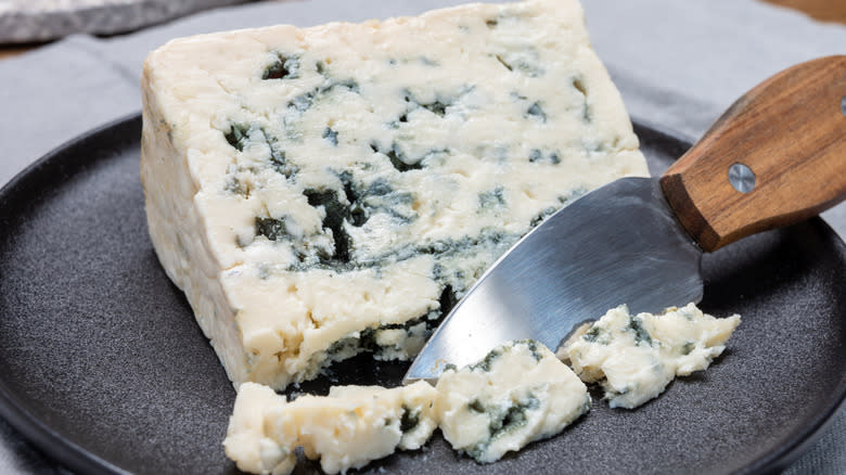 Roquefort blue cheese with cheese knife