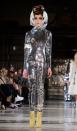 <p>This sequinned jumpsuit sure is sparkly, but you might get mistaken for a roll of tin foil. [Photo: Rex] </p>