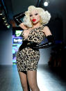 <p>Trans icon Amanda Lepore walked the Tumbler and Tipsy runway, and her signature red lip and falsies inspired the beauty look for the other models as well. (Photo: Getty Images) </p>