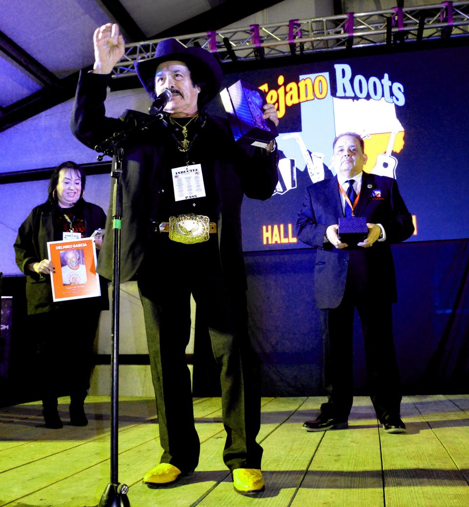 Rene Saenz addresses the crowd at the Tejano ROOTS Hall of Fame. The longtime South Bend resident was inducted into the hall for his work in promoting Tejano music in the area.