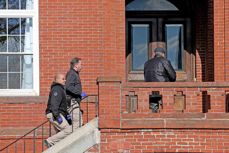 <p>Matt Stone/MediaNews Group/Boston Herald via Getty Images</p> Boston police investigating the scene in November 2022.