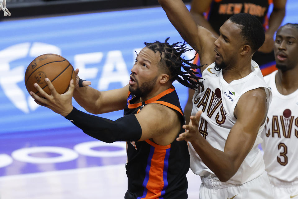 New York Knicks guard Jalen Brunson shoots against Cleveland Cavaliers forward Evan Mobley (4) during the second half of Game 2 of an NBA basketball first-round playoff series, Tuesday, April 18, 2023, in Cleveland. (AP Photo/Ron Schwane)