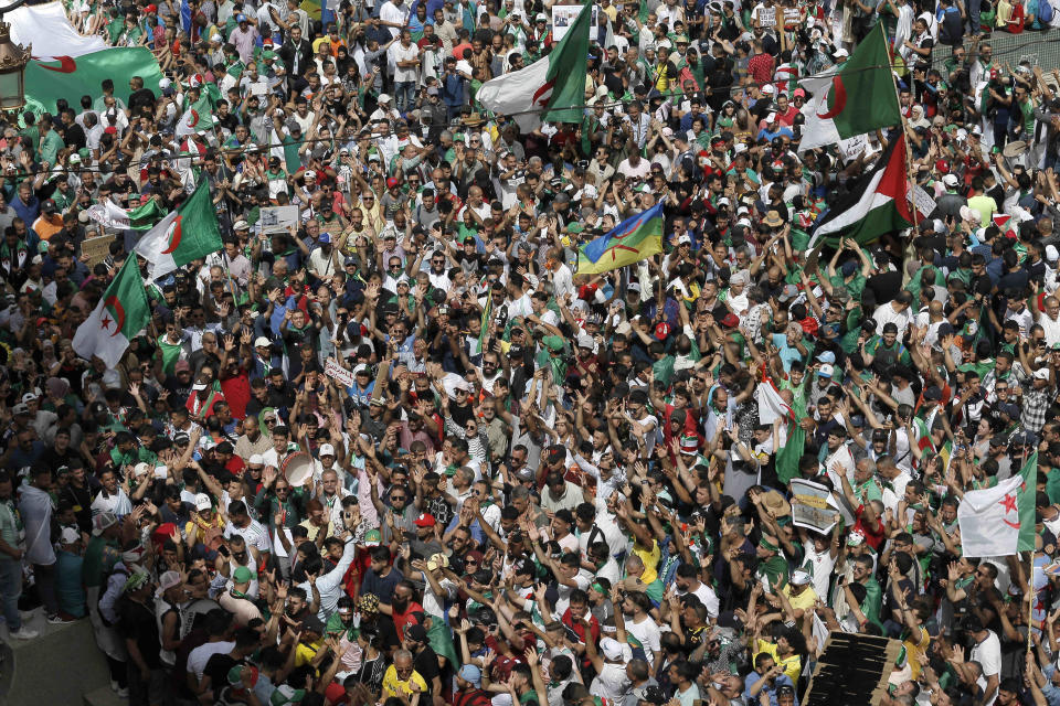 Algerian protesters gather during an anti-government demonstration in the centre of the capital Algiers, Algeria, Friday, June 7, 2019. (AP Photo/Toufik Doudou)