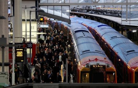 On the day that rail fares increase, passengers arrive at Waterloo Station in London, Britain January 2, 2018. REUTERS/Peter Nicholls