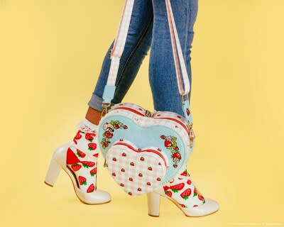 Stroll through Strawberryland in style with a special 45th anniversary collection featuring backpacks, crossbody bags, wallets and more from fandom favorite Loungefly. (CNW Group/WildBrain Ltd.)