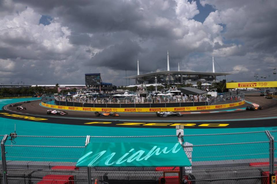 Formula One cars exit Turn 7 at the MIA Marina during the inaugural Formula One Miami Grand Prix auto race at Miami International Autodrome on Sunday, May 8, 2022 in Miami Gardens, Florida.