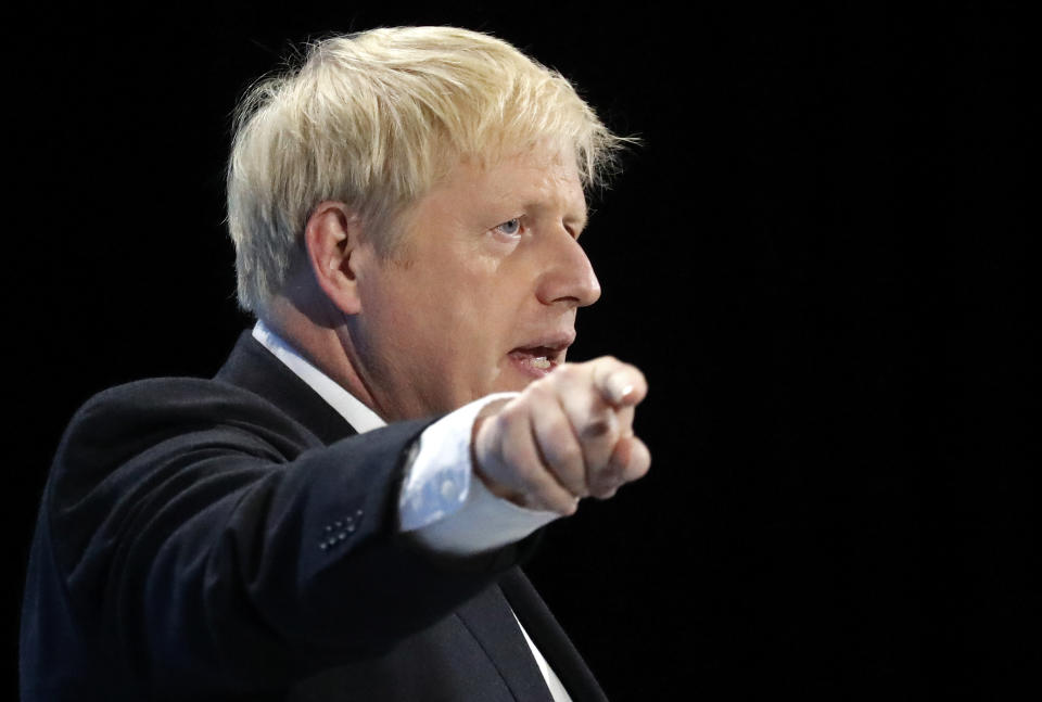 Conservative party leadership candidate Boris Johnson delivers his speech during a Conservative leadership hustings at ExCel Centre in London, Wednesday, July 17, 2019. The two contenders, Jeremy Hunt and Boris Johnson are competing for votes from party members, with the winner replacing Prime Minister Theresa May as party leader and Prime Minister of Britain's ruling Conservative Party. (AP Photo/Frank Augstein)