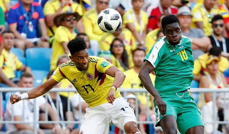 Soccer Football - World Cup - Group H - Senegal vs Colombia - Samara Arena, Samara, Russia - June 28, 2018 Colombia's Johan Mojica in action with Senegal's Ismaila Sarr REUTERS/Max Rossi