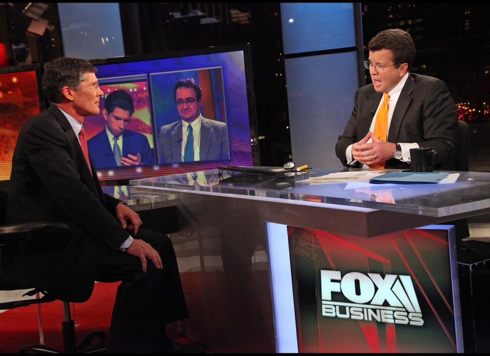 NEW YORK, NY - OCTOBER 27:  (EXCLUSIVE COVERAGE) FOX Business Network's Neil Cavuto (R) interviews former Merrill Lynch Chief Executive and current head of CIT Group John Thain at FOX Studios on October 27, 2011 in New York City.  (Photo by Rob Kim/Getty Images)