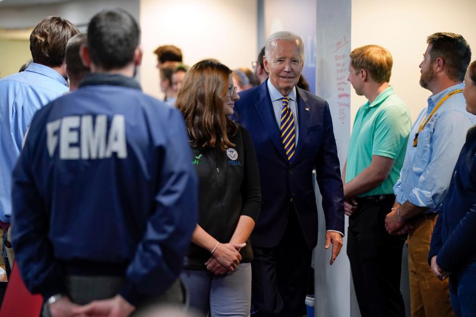 President Joe Biden walks with FEMA Associate Administrator of the Office of Response and Recovery Anne Bink as he visits FEMA headquarters, Thursday, Aug. 31, 2023, in Washington, to thank the team staffing the FEMA National Response Coordination Center (NRCC) throughout Hurricane Idalia and the ongoing federal response efforts to the fires on Maui, Hawaii. (AP Photo/Evan Vucci) ORG XMIT: DCEV409