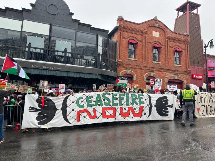 Pro-Palestinian protesters on Main Street in Park City, Utah during the Sundance Film Festival on Sunday, Jan. 21, 2024.