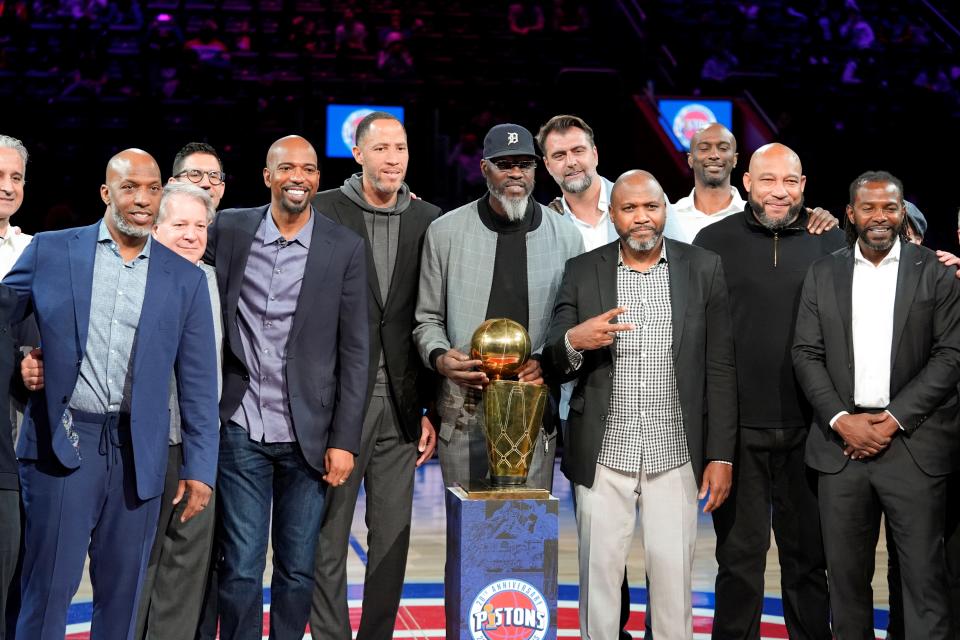 Members of the Detroit Pistons' 2004 NBA championship team are recognized during halftime at Little Caesars Arena in Detroit on Sunday, March 17, 2024.