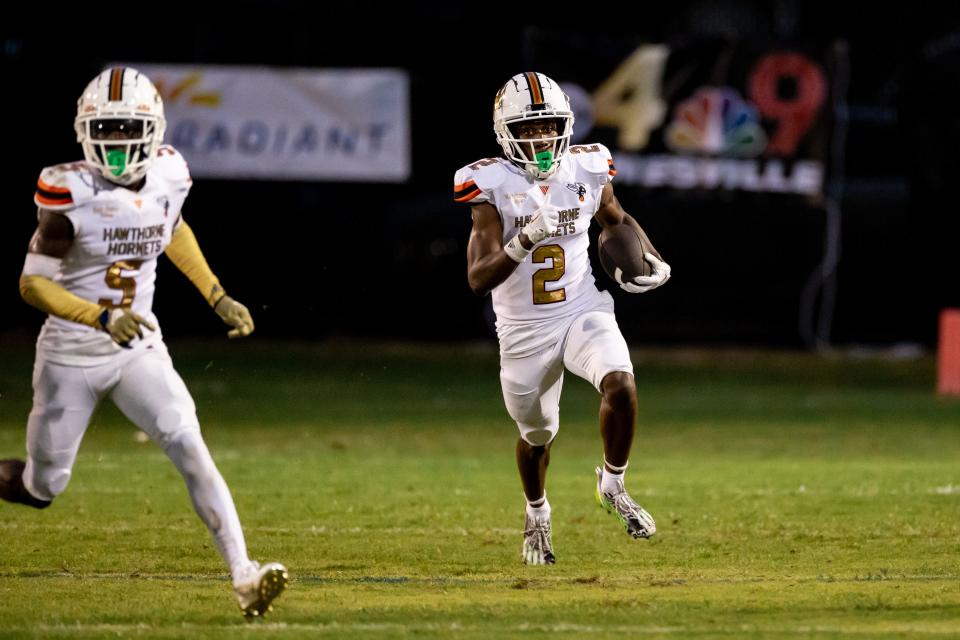 Hawthorne Hornets wide receiver Alvon Isaac (2) runs with the ball after a kickoff en route to a touchdown during the first half against the Newberry Panthers at Newberry High School in Newberry, FL on Friday, September 1, 2023. [Matt Pendleton/Gainesville Sun]