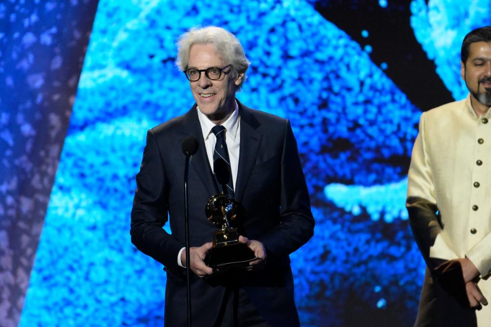 Stewart Copeland accepts the award for best immersive audio album during the Grammy Awards Premiere Ceremony on Feb. 5. The Police drummer will perform with the Erie Philharmonic in October.