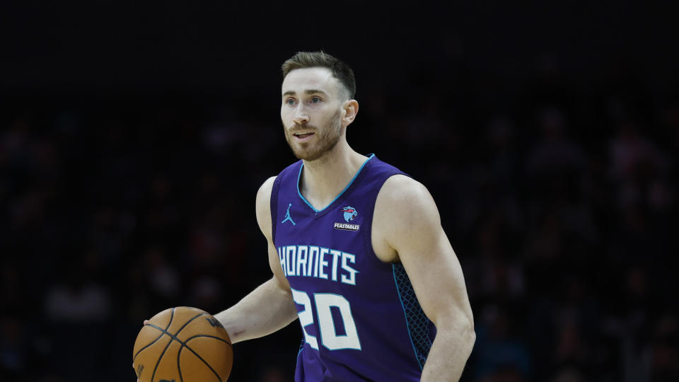 FILE - Charlotte Hornets forward Gordon Hayward brings the ball upcourt against the Denver Nuggets during the first half of an NBA basketball game in Charlotte, N.C., Saturday, Dec. 23, 2023. The Charlotte Hornets are sending often-injured small forward Gordon Hayward to the Oklahoma City Thunder in exchange for guard Tre Mann, power forward Davis Bertans, point guard Vasilije Micic and two second round draft picks, according to a person familiar with the situation. The person spoke to The Associated Press on condition of anonymity Thursday, Feb. 8, 2024, because the deal has not yet been approved by the league.(AP Photo/Nell Redmond)