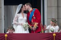 <p>The first kiss at a royal wedding is up there with the most anticipated moments of the day, and this image of William and Kate did not disappoint. Disgruntled bridesmaid Grace van Cutsem helped to make it even more memorable.</p>