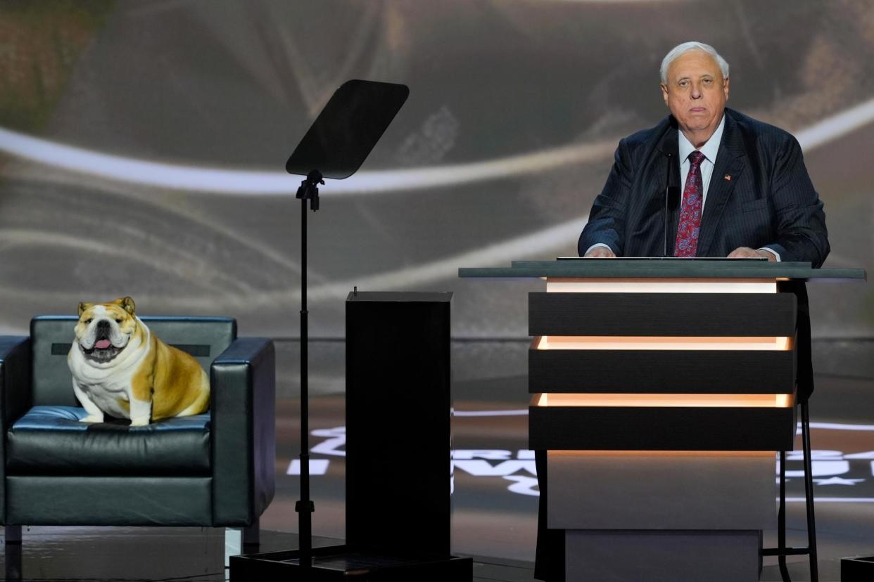 <span>Jim Justice, right, with his dog named Babydog, during the Republican National Convention in Milwaukee on 16 July 2024.</span><span>Photograph: J Scott Applewhite/AP</span>