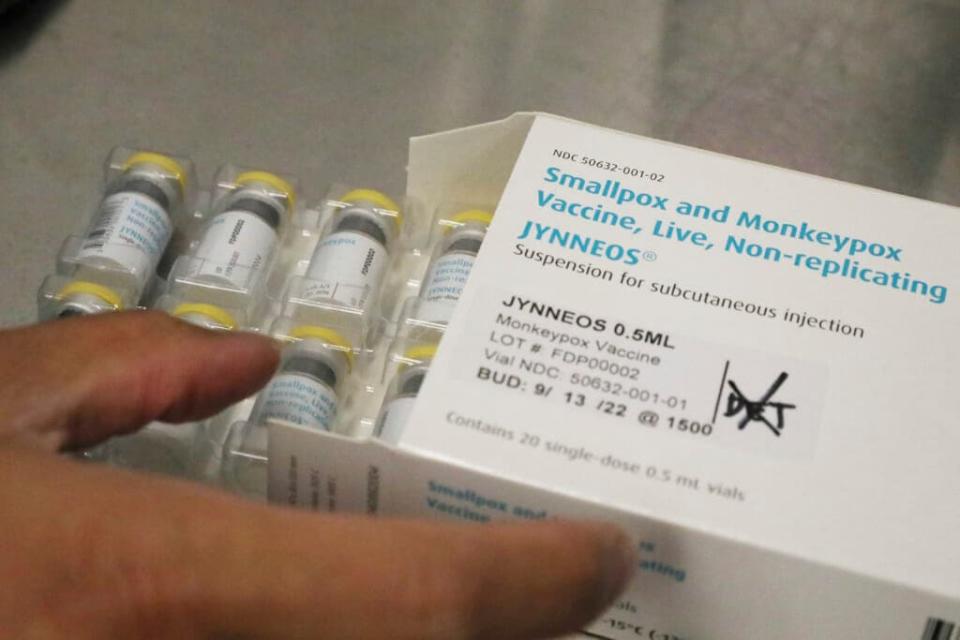 FILE – Jonathan Parducho, a pharmacist, removes a tray of vials of of the Jynneos vaccine for monkeypox from a box containing 20 doses, in the vaccine hub at Zuckerberg San Francisco General Hospital, July 29, 2022, in San Francisco. The U.S. will declare a public health emergency to bolster the federal response to the outbreak of monkeypox that already has infected more than 6,600 Americans. That’s according to two people familiar with the matter said. (Lea Suzuki/San Francisco Chronicle via AP)