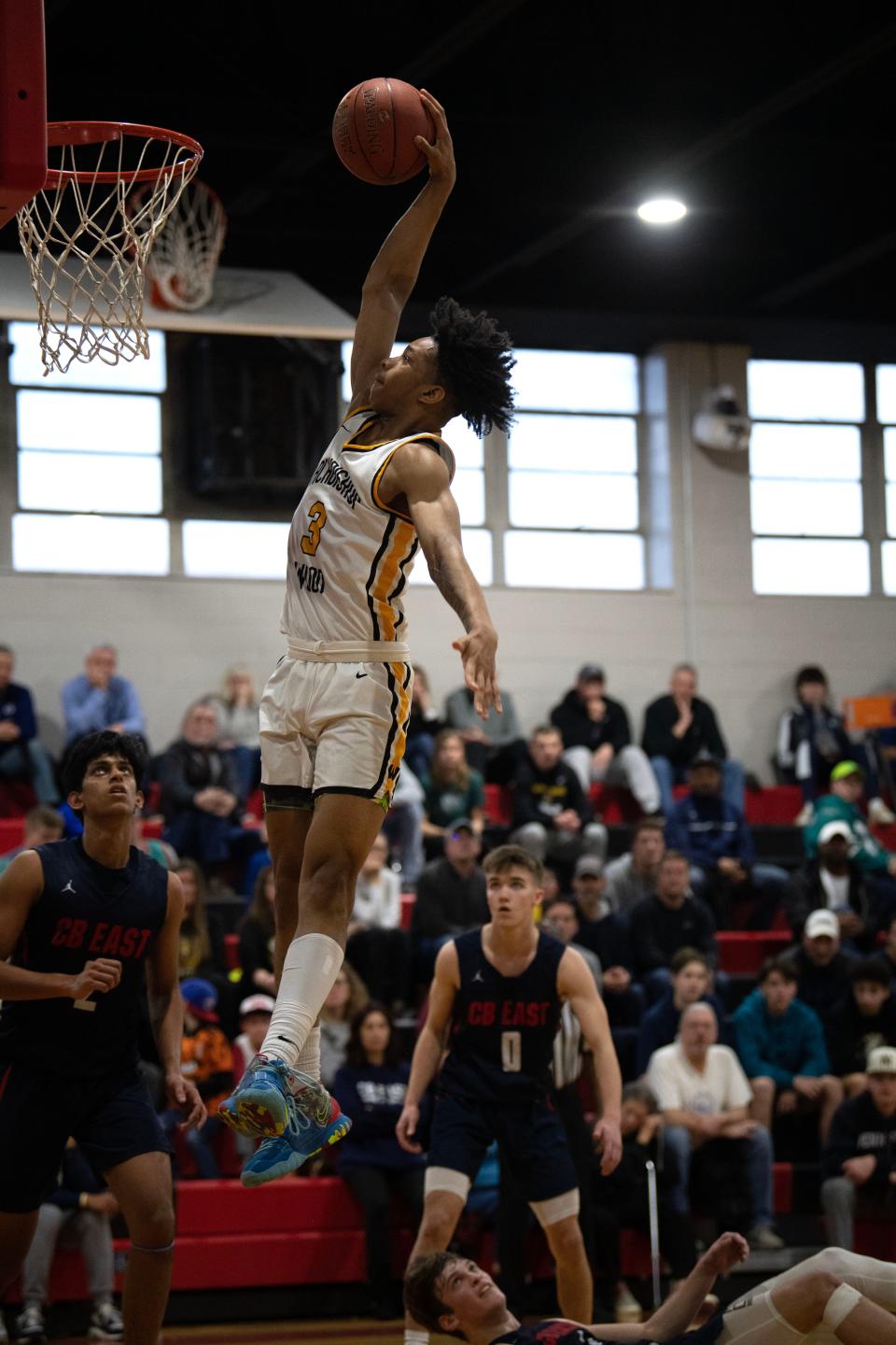 Archbishop Wood sophomore Milan Dean goes up for the dunk during the Vikings' 61-37 PIAA 6A first-round win over Central Bucks East.