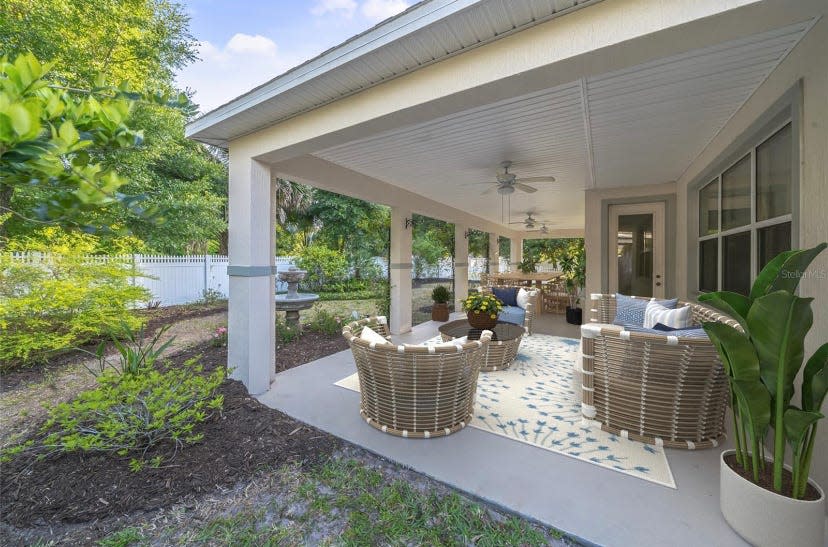 This beautifully maintained DeLand home features an elegant and thoughtful open-floor plan that was designed to cater to a variety of lifestyles (Virtually staged).