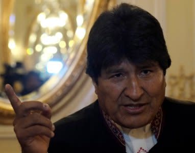 FILE PHOTO: Bolivia's President Evo Morales speaks during a meeting with international press correspondents at the presidential palace in La Paz, Bolivia, March 13, 2018 . REUTERS/David Mercado