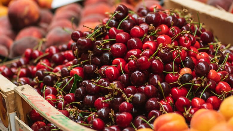 cherries at farmers market stand